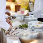 Waiter serving a tasty fish